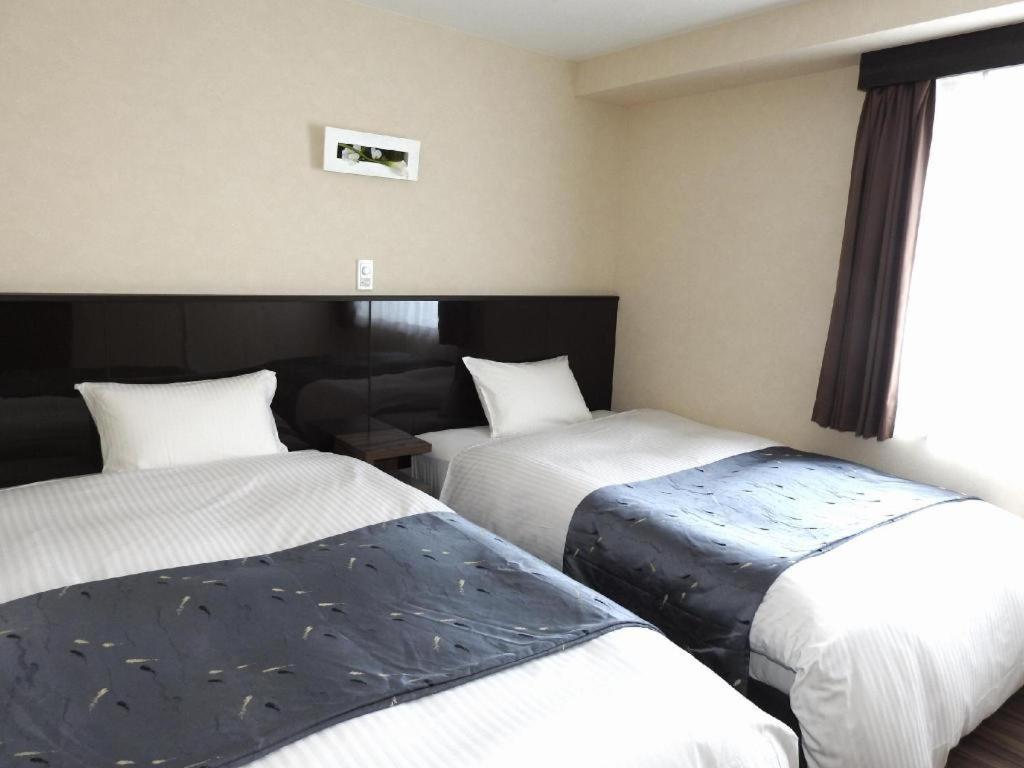 Hotel Bougainvillea Minowa Tokio Buitenkant foto